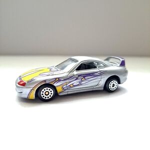 MotorMax (6012) Toyota Supra Diecast Silver w/ Yellow & Purple Flames